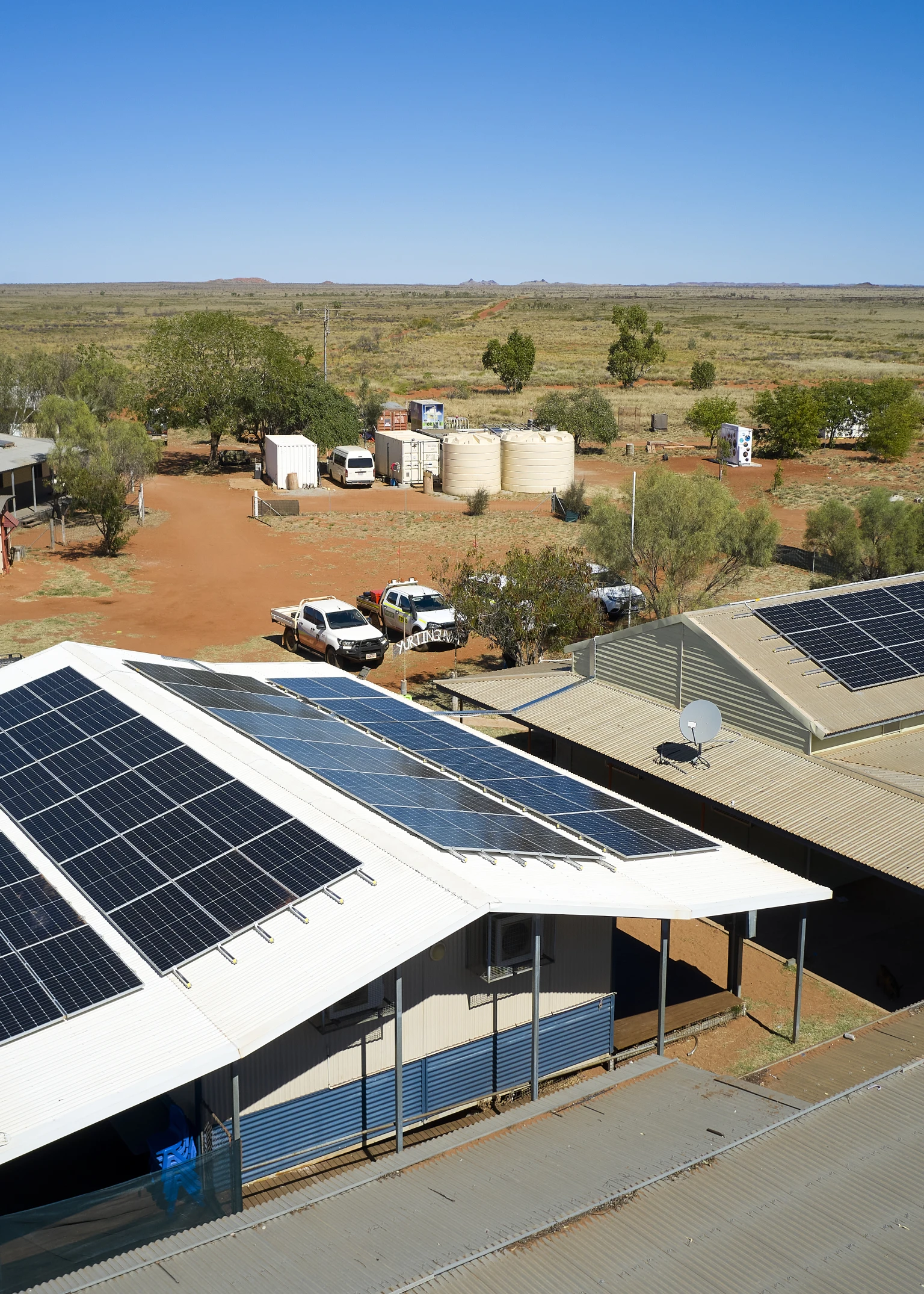 Solar panels on top of a school building in a remote community